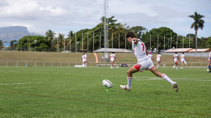 Ashton Ward moves in to convert an early try.