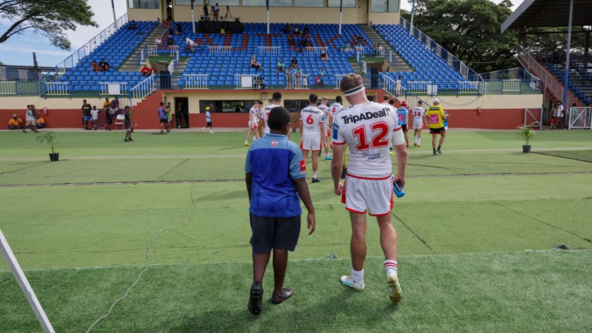 Jack Quine has a chat with a young fan following the match.