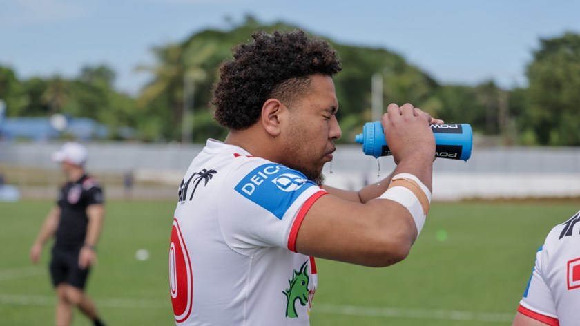 Cyrus Stanley-Traill staying hydrated on a warm Fijian morning.