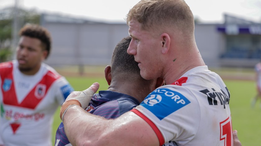 Jacob Webster and Jeremaia Keteca embrace after a hard-fought clash.