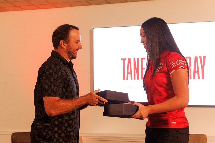 Taneisha Gray receiving her Tarsha Gale Cup Player of the Year and Players' Player awards