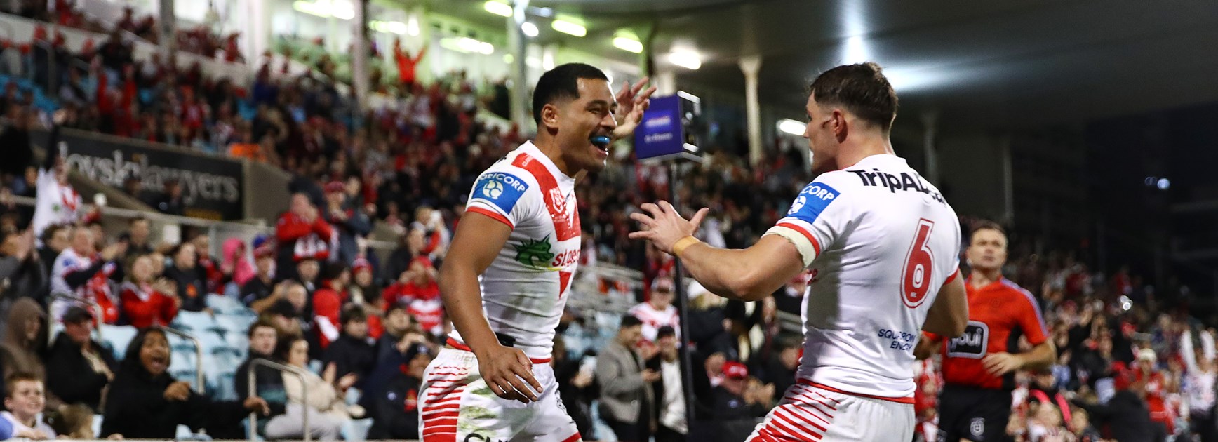 Mat Feagai and Kyle Flanagan celebrate a try in Round 14. 